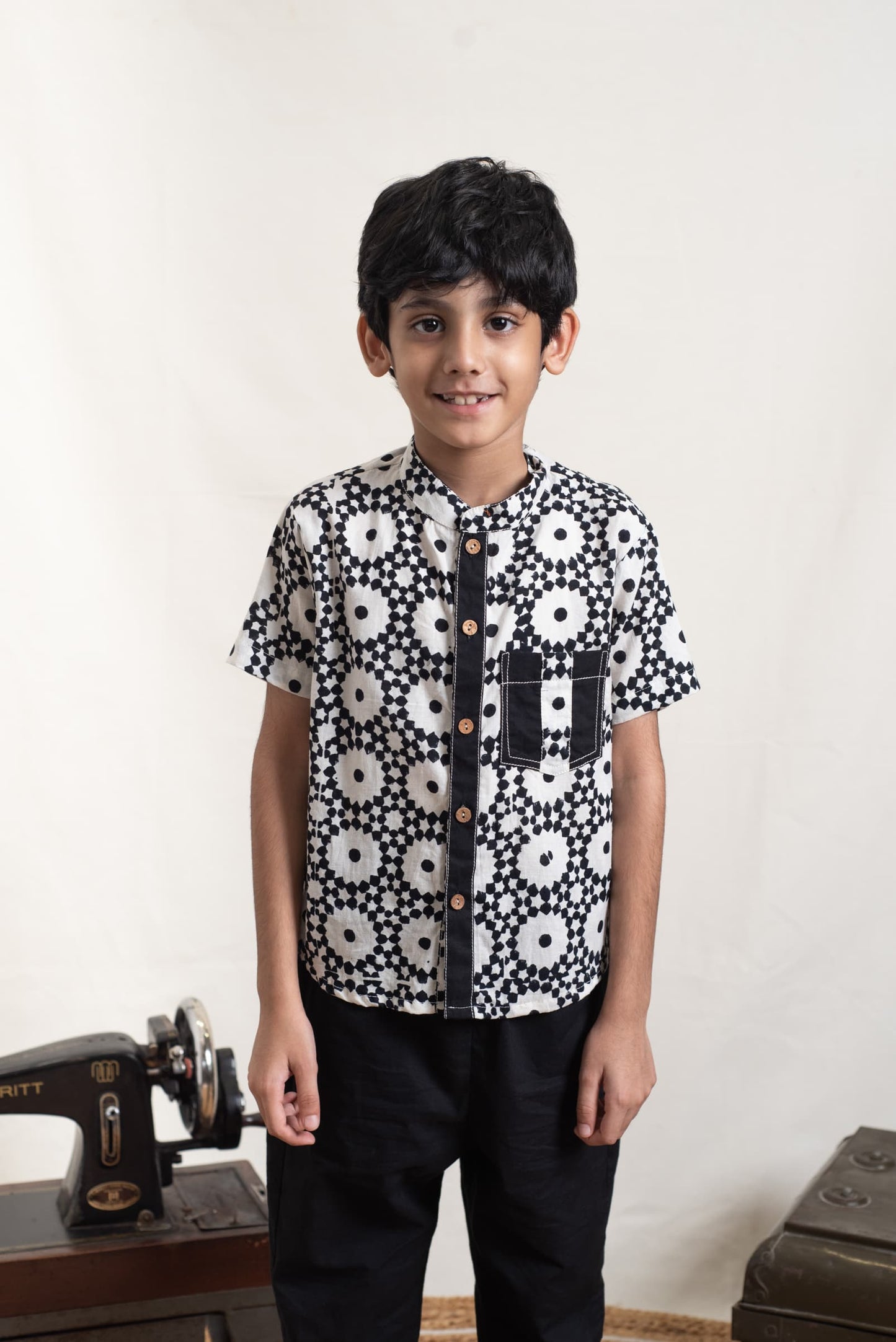 black and white kids shirt close-up print detail