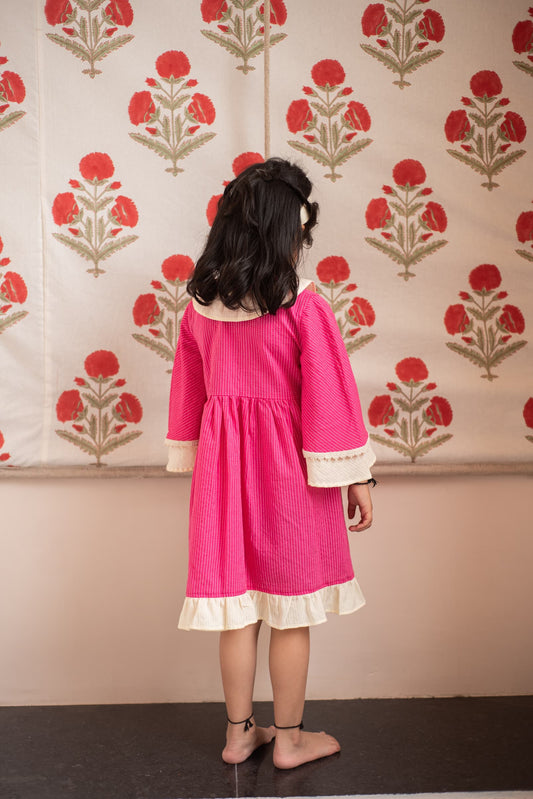 kids party dress pink ruffle close‑up