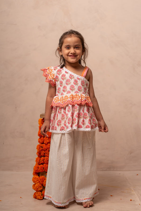 Pink corduroy kids outfit close-up